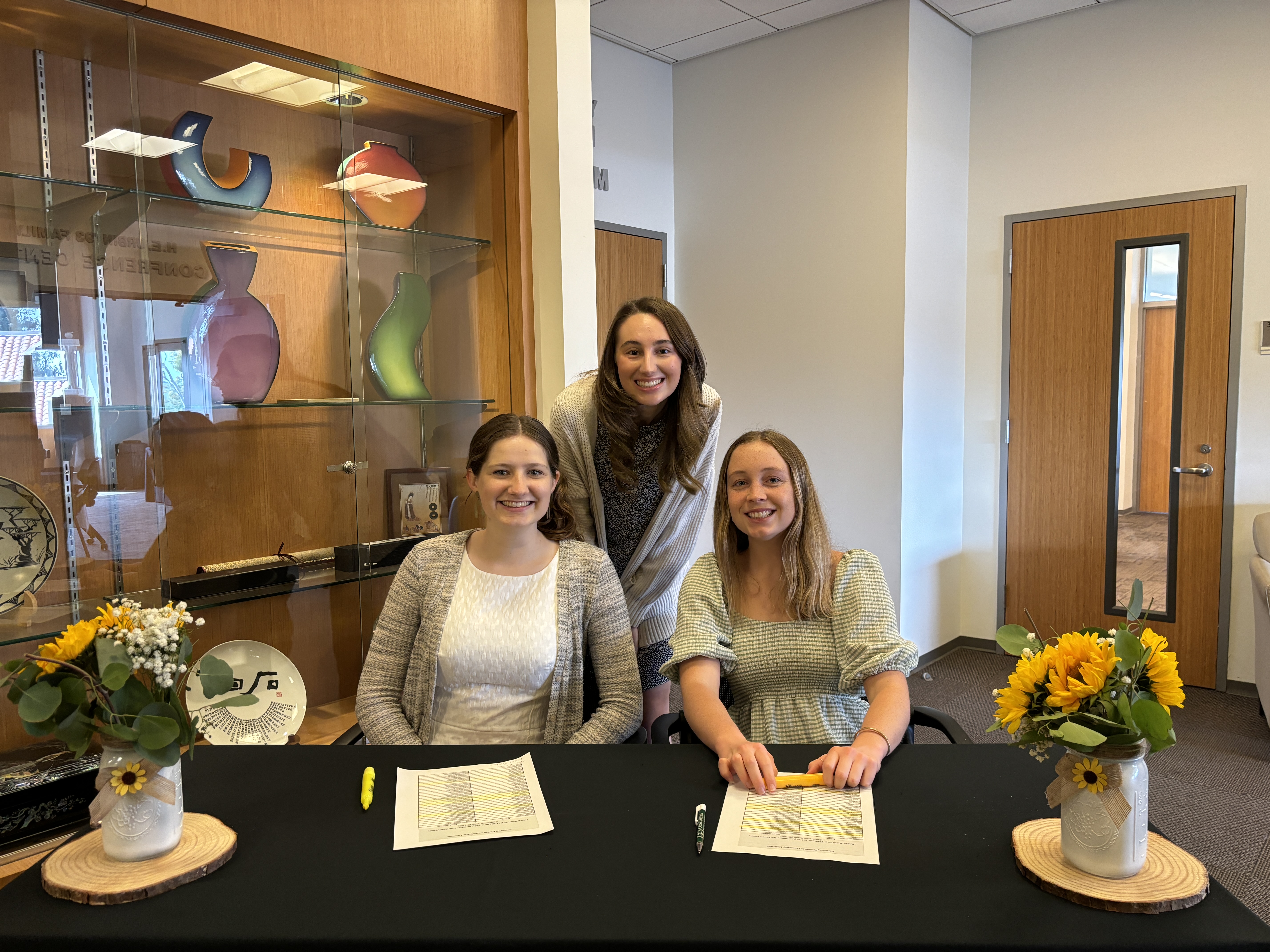 Representatives from Women in Business club volunteer at the event